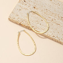 Load image into Gallery viewer, The Hammered Oval Earring
