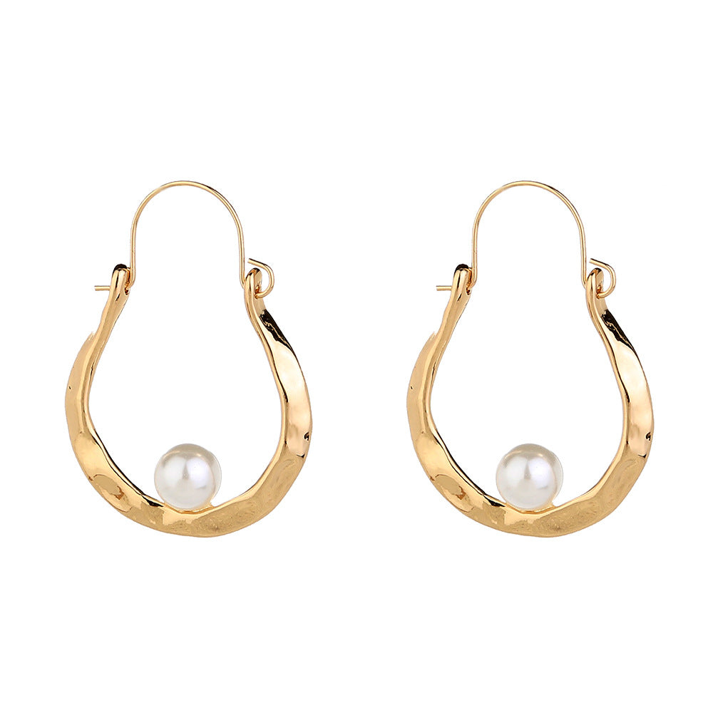 The Pearl Ushaped Earring