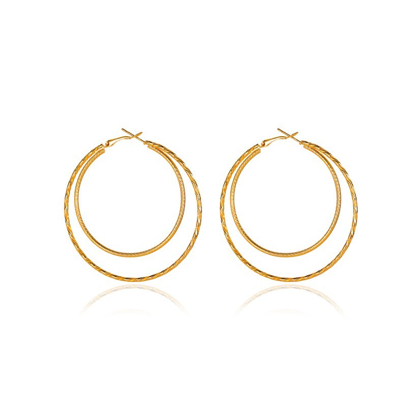 The Double Loop Earring in Gold and Silver