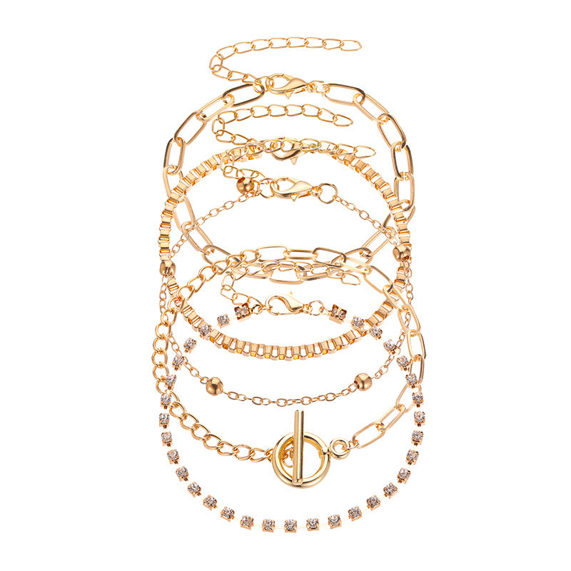 The OT 5-Piece Layered Bracelet Set in Gold and Silver