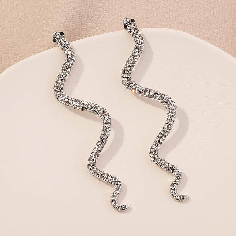 The Snake Wave Earring in Gold or Silver